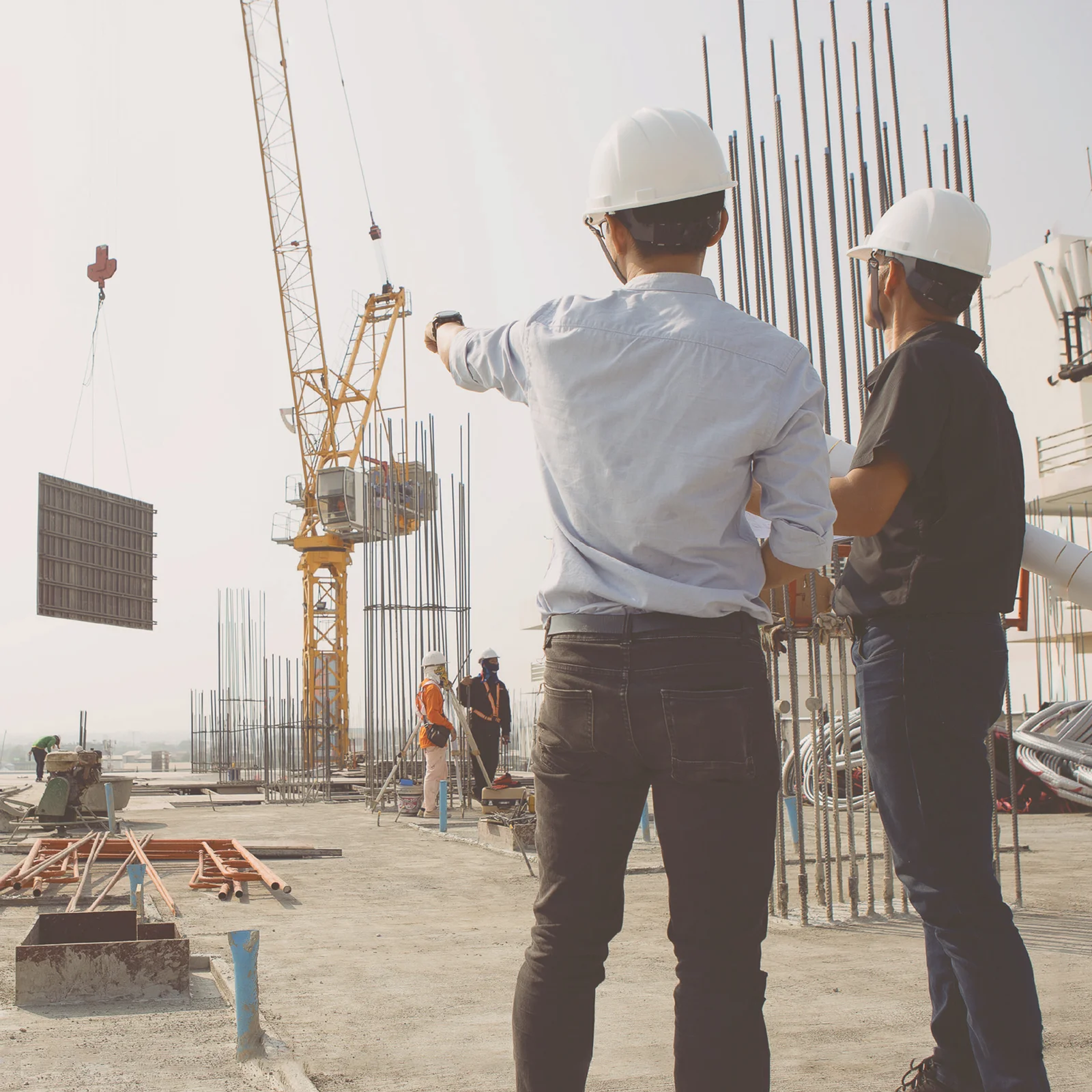 Atrium engineers reviewing work on an active site
